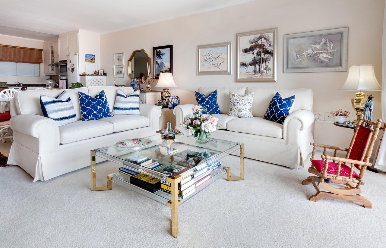 Light living room with white sofas